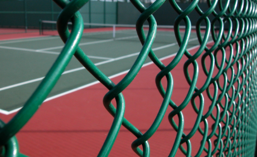 This is a photo of a new tennis court fence installed in Hampshire, All works carried out by Tennis Court Construction Hampshire