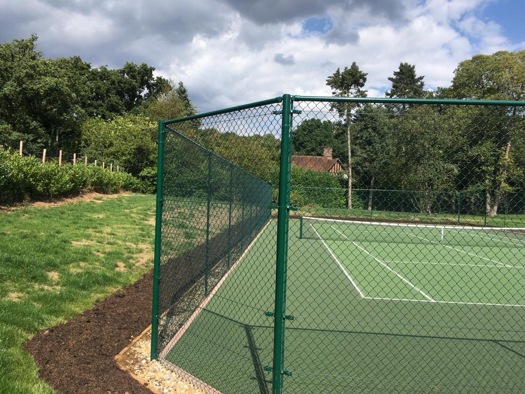 This is a photo of a new tennis court fence installed in Hampshire, All works carried out by Tennis Court Construction Hampshire