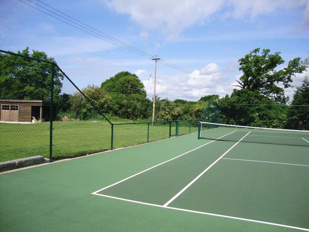 This is a photo of a new tennis court installed in Hampshire, All works carried out by Tennis Court Construction Hampshire